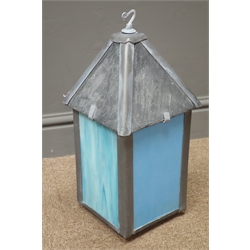  Lantern, with four stained coloured panes and slate top, battery controlled colour changes, W19cm, H43cm, D19cm  