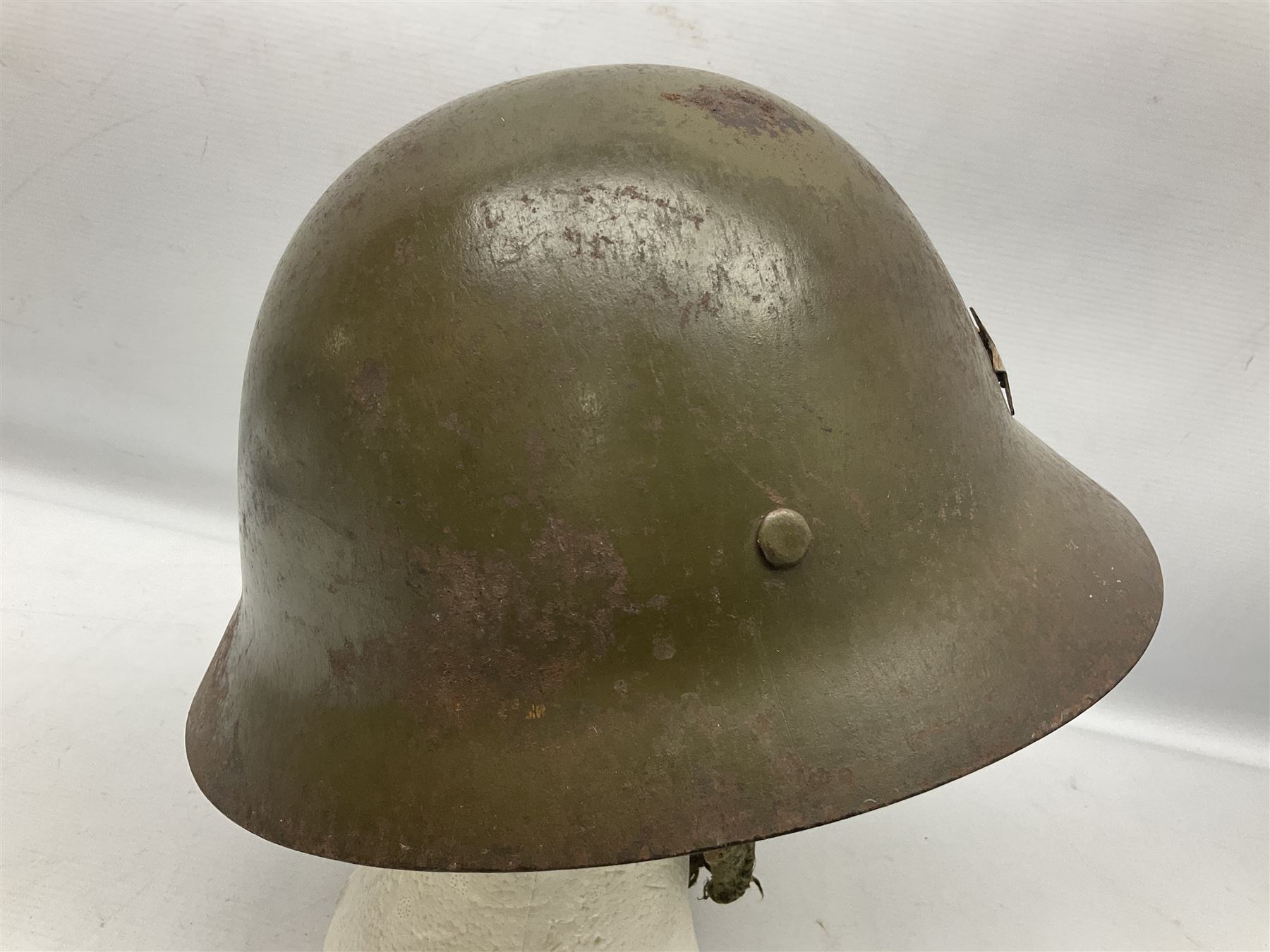 WW2 Japanese Army type 92 steel helmet with infantry star badge to centre, webbing liner and