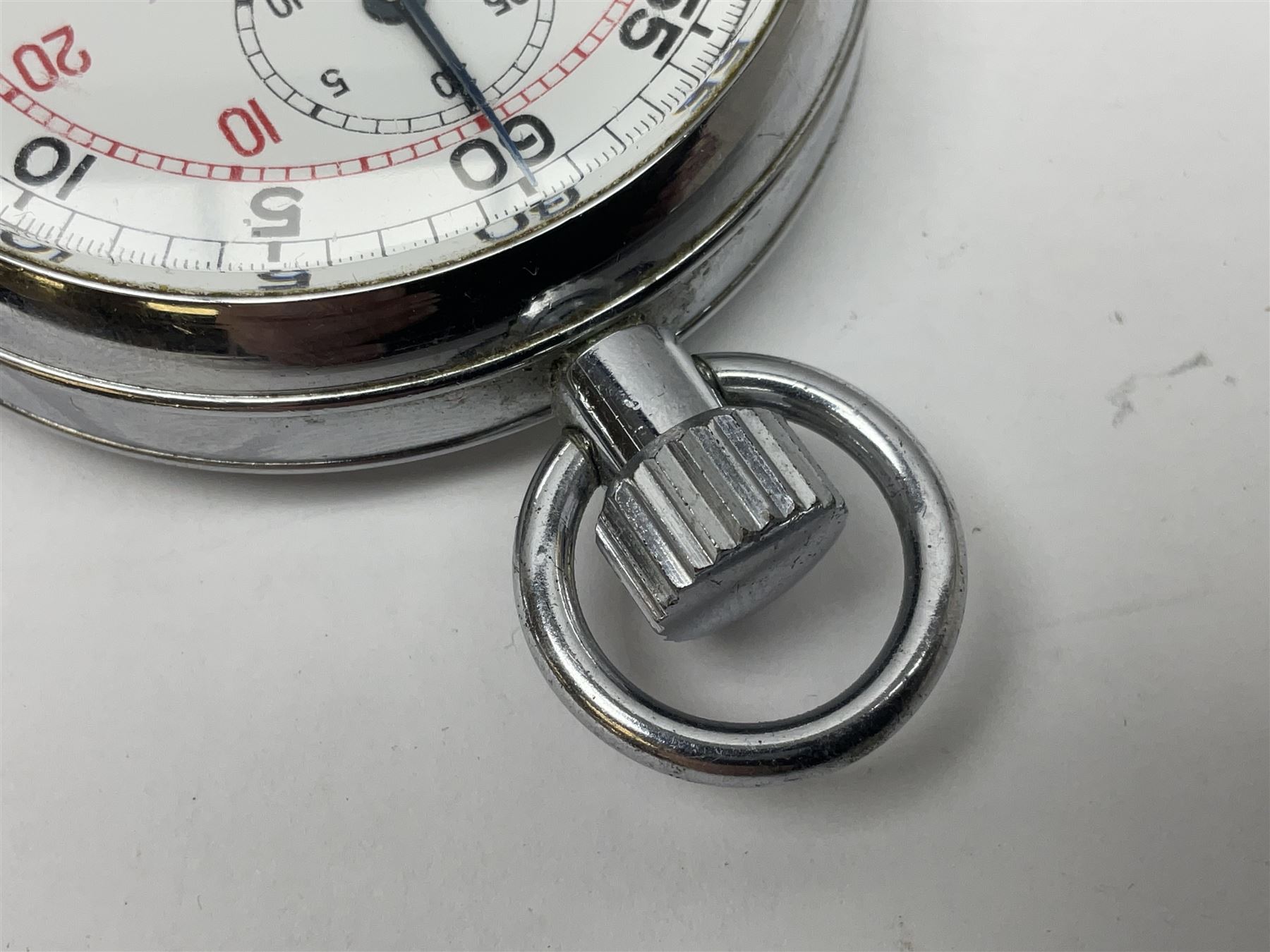 Nero Lemania - Royal Air Force type military stopwatch, outer black register for 60 seconds with 1/5th seconds divisions, inner red register to 100 with 1/10 divisions, subsidiary dial recording to 30 minutes, signed and marked with Broad Arrow, case back engraved '0552/521-3169' Broad Arrow '152/70'; together with a Balmaster Antichoc 1/10 4 Rubis stopwatch (2)