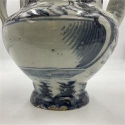 Tin glazed earthenware wet drug jug, decorated with cherubs in a landscape, H90cm 