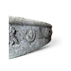 Cast stone planting circle, detailed with flower motifs and roundels