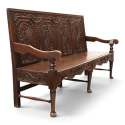19th century Gothic Revival heavily carved oak settle or hall bench, the high quadruple ba...