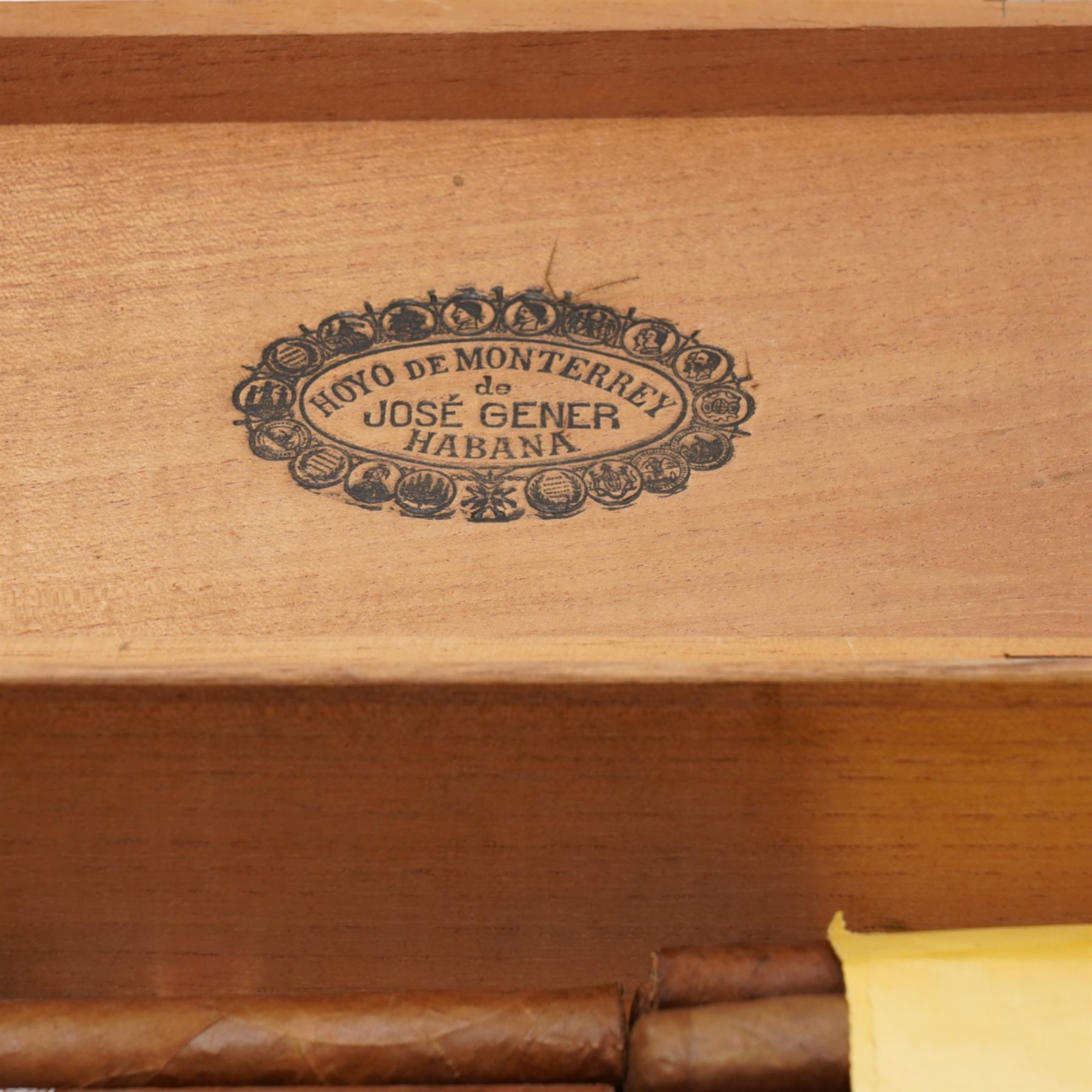 Four Cuban Cohiba cigars, six Montecristo cigars, two Romeo y Julieta and eighteen other Cuban cigars without labels in an earlier Hoyo de Monterrey de Jose Gener cigar box