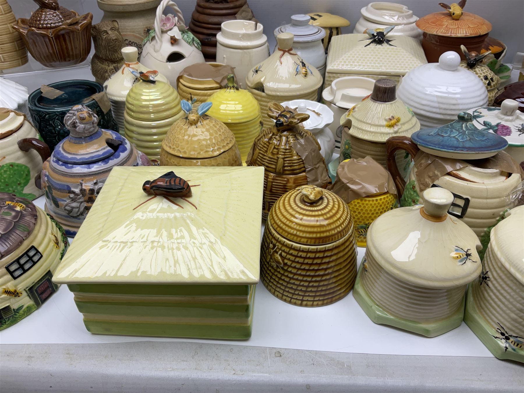 Large collection of honey pots, of various shapes, to include examples from Crown Devon, Marutomo ware, W.H Gloss, Goebel etc 