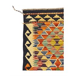Chobi Kilim flatweave rug, dark navy ground with a vibrant multicoloured diamond lattice, framed by stylised border motifs, braided corner tassels