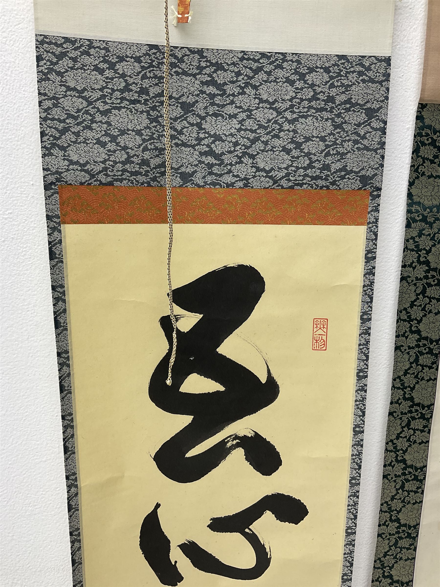 Two 20th century Japanese kakemono, the first example depicting a puffer fish, the second with Japanese Calligraphy 