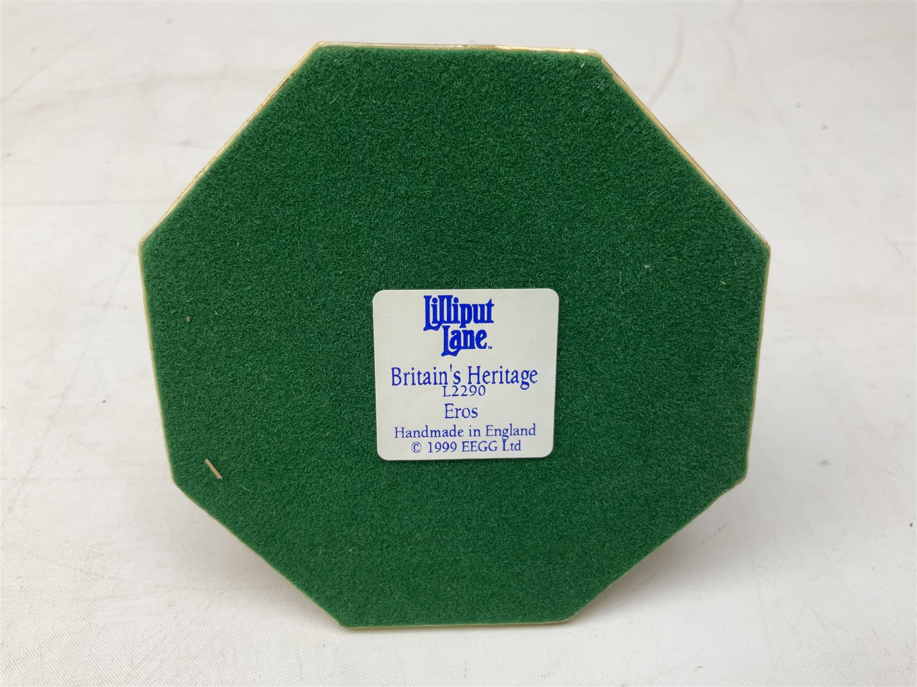 Five Lilliput Lane models from the 'Britain's Heritage' collection, comprising The Royal Albert Hall, Windsor Castle Round Tower, Eros and Nelson's Column and another snowed, all boxed