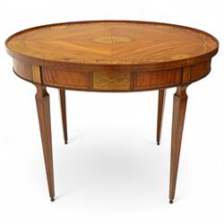 Aldam Heaton & Co (fl.1878-97) - late 19th century Sheraton revival style satinwood inlaid oval centre table, raised inlaid edge, centre with finely executed large central  inlaid medallion, surrounded by ribbon tied swags interspaced with medallions, frieze with rectangular symmetrical panels of foliate sprays of acanthus leaves, raised on four square section tapering legs with cavetti shaped shoulders with stringing on brass bulb feet, underside with bone plaque signed Aldam Heaton & Co, Baker St, London