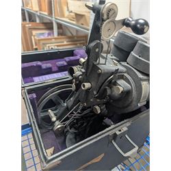 Collection of projectors, including Bell & Howell 613 cine projector, E J Arnold slide projector, Bolex home projector, Aldis 303, Bell & Howell Filmo 57 model projector, Leitz Wetzlar Pradovit Color, Kodak Instamatic M55L movie projector and a Gnome slide projector