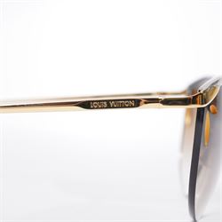 Louis Vuitton - pair of half-rim sunglasses, with gradient tinted lenses with pierced corners, silver and gold-tone frame, the temples signed ‘Louis Vuitton’, unused with original pouch, leather box, booklet and outer box