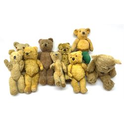 Nine English teddy bears 1950s-60s including wood wool filled Pedigree bear with swivel jointed head, glass eyes, vertically stitched nose and mouth and jointed limbs H14.5