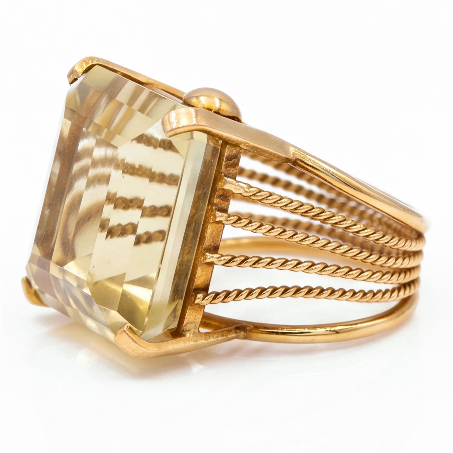 18ct gold citrine ring, single large octagonal cut citrine, with split rope twist design shoulders