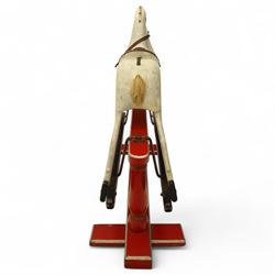 20th century carved and painted rocking horse, with original dappled paint finish, studded leather saddle and reins, on later red and black swing frame