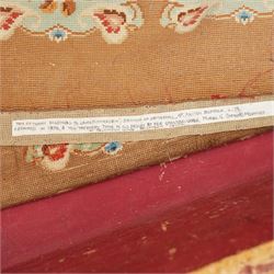 Victorian Ottoman with tapestry cover, with multicoloured geometric needlepoint cover, hinged to reveal a pink paper lined interior, the base covered in green velour fabric, raised on later castors