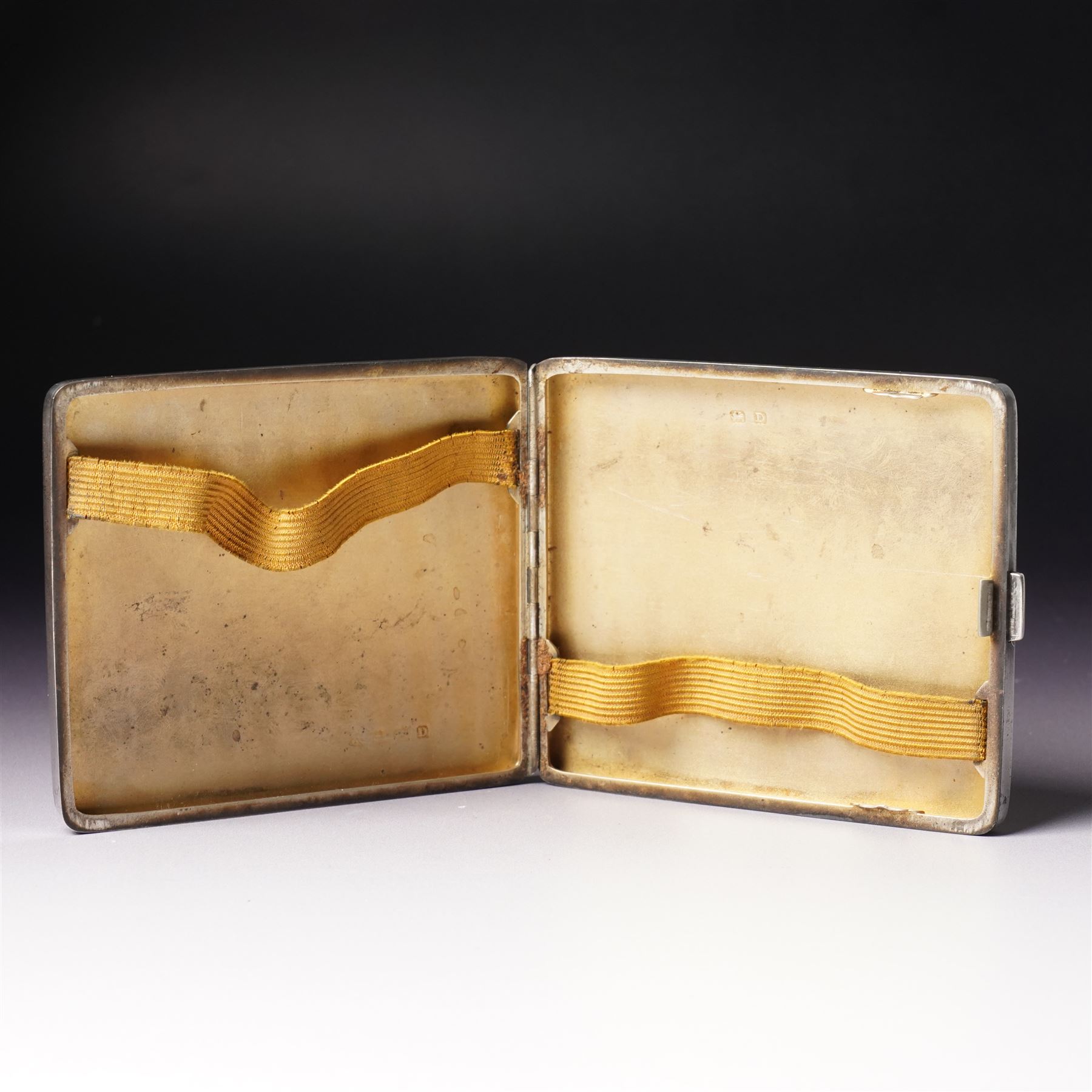 Engine turned silver cigarette case engraved with initials and with gilded interior Birmingham 1928