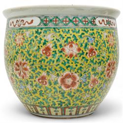 19th century Chinese famille jaune jardiniere decorated with trailing flowers and leaves on a yellow ground H34cm x 40cm