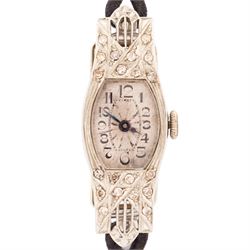 Art Deco 18ct white gold diamond ladies manual wind wind wristwatch, silvered engine turned dial with Arabic hour markers, the pierced design case milgrain set with single cut diamonds, Glasgow import mark 1928, on black cord strap, with stainless steel clasp