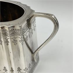 Victorian three-piece silver tea service, comprising teapot, twin handled open sucrier and milk jug, of oval form with shaped rim and C handles, each engraved with crests and bands of strapwork decoration, the milk jug and sucrier with gilt interiors, hallmarked Josiah Williams & Co, Exeter 1881, the teapot with ivory insulators and finial, all contained with a tooled leather, blue silk and velvet lined fitted case, retailed by West & Sun, Dublin 
This item has been registered for sale under Section 10 of the APHA Ivory Act