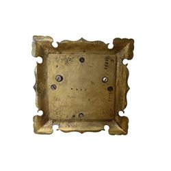 Tiffany- early 20th century brass cased 8-day mantle clock, rectangular case with engraved images taken from classical & mythological fables, with an open strapwork dome, finials to the corners and a cast figure of a standing maiden, case raised on a splayed base with acanthus engraving, enamel dial with Roman numerals, minute markers and steel hands, dial centre engraved Tiffany & Co Paris, twin train French movement with a platform escapement wound from the rear, baseplate of case stamped with the serial numbers 4372 & 5652. With key. 
Provenance from Chatsworth House, Derbyshire.
