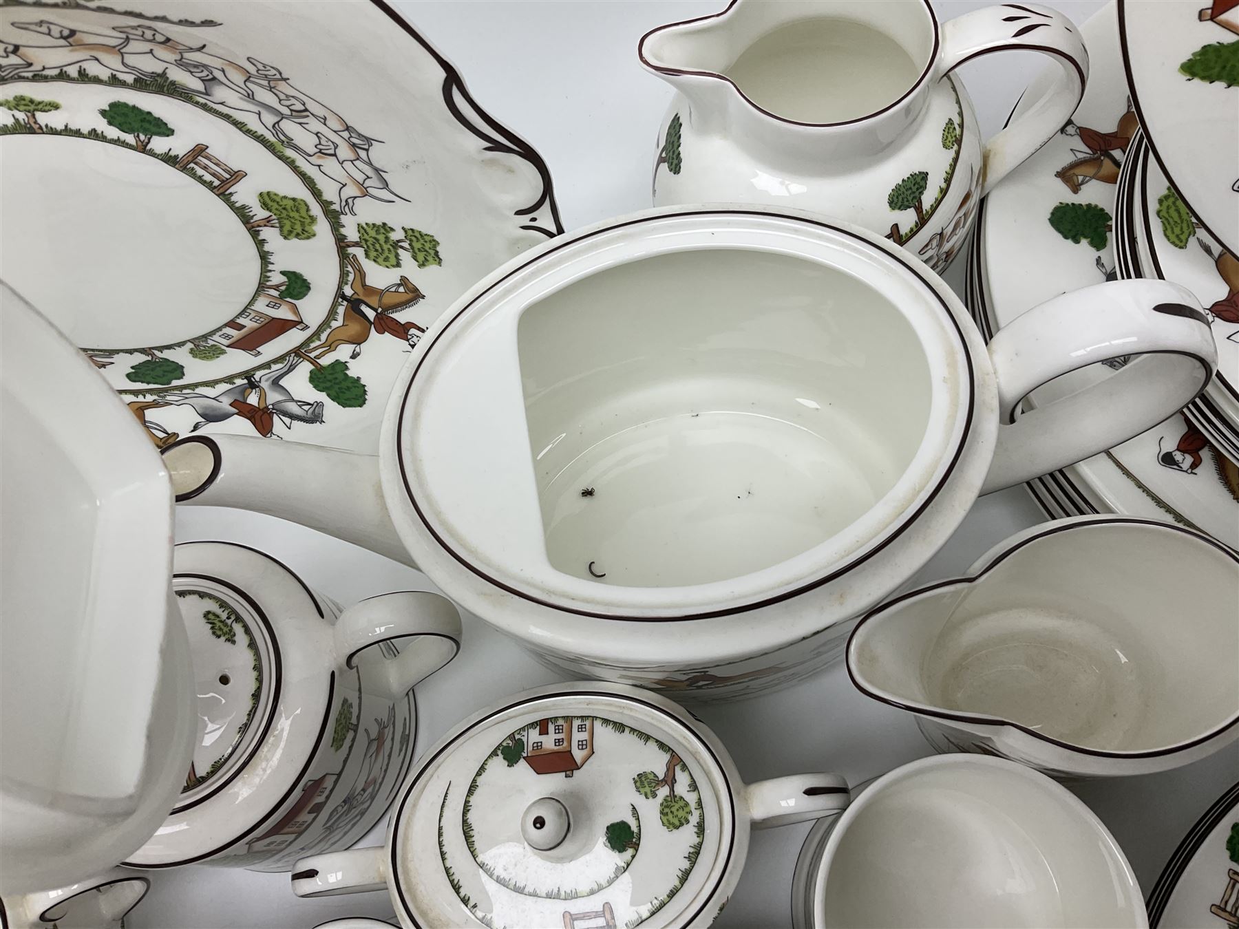 Wedgwood Hunting Scenes dinner and tea service for ten, to include dinner plates, side plates, dessert plates, cups and saucers, mugs, two large teapots, two milk jugs, etc, together with matching items by coalport and Staffordshire (94)