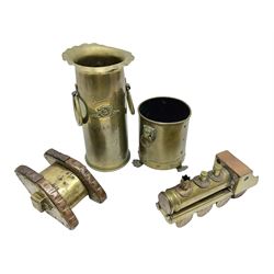 Trench Art - WWI 0-8-0 steam locomotive made from brass, copper and late Victorian pennies and half-pennies L17.5cm; WWI brass and copper tank candleholder; WWI brass shell case two-handled vase inscribed 'RFA France 1914-17'; and an unrelated brass plant holder (4)