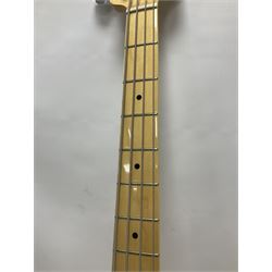 Fender Precision Bass guitar, in Olympic White finish with tortoiseshell effect scratchboard, serial no US15103092, in black Fender hard case with Fender strap and warranty card, guitar L116cm