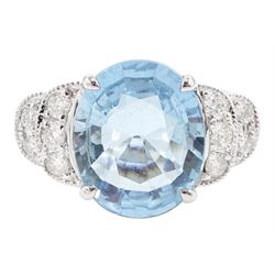 18ct white oval cut aquamarine ring, with milgrain set diamond, stepped design shoulders, ...