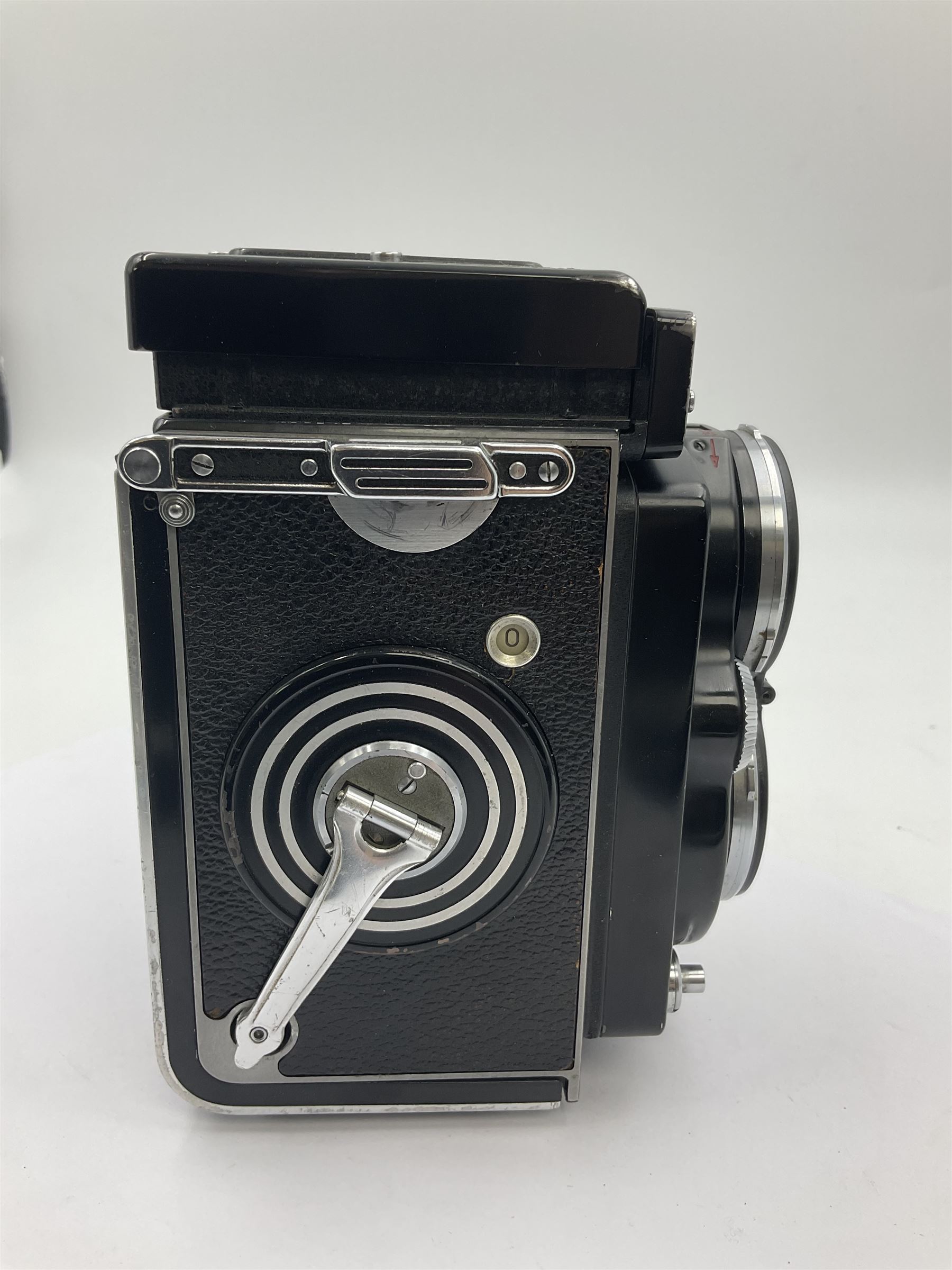 Rolleiflex Series E twin lens camera body, serial no. 1623867, with 'Planar 1.28 f-80mm' lens and 'Heidosmat 1:2.8/80' lens 