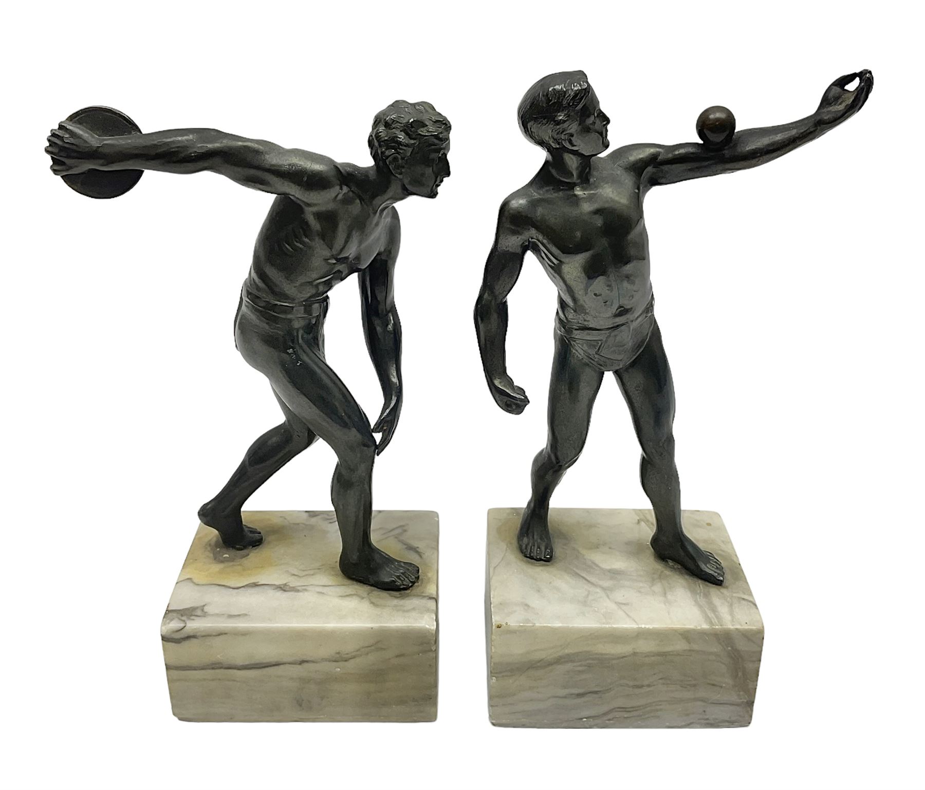 Bronzed model of the discus thrower and another of a episkyros player, both raised upon retangular plinths, H18cm