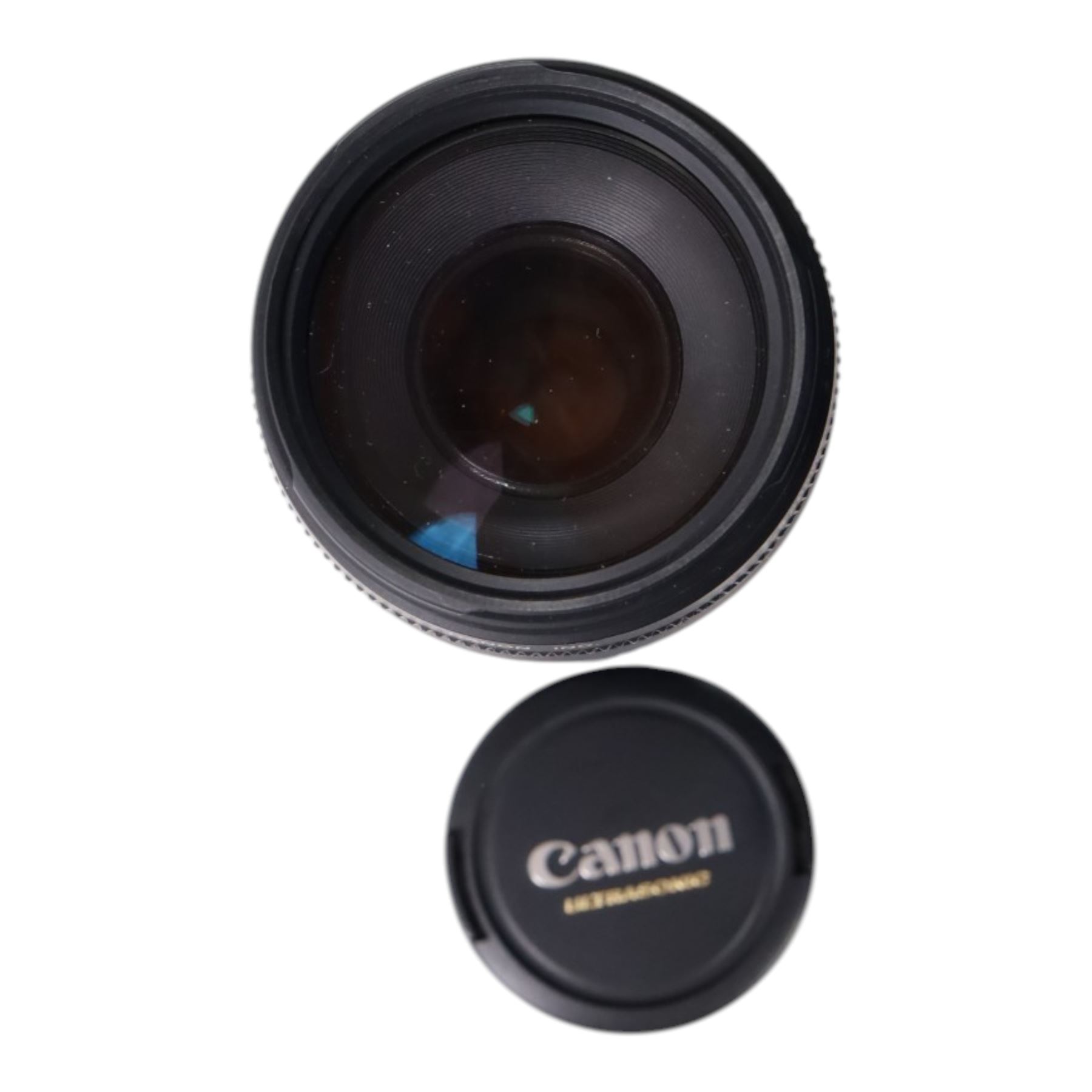 Eight camera lenses, comprising Canon Ultrasonic Zoom EF 75-300mm 1:4-5.6 lens, AF Nikkor 35-70mm 1:3.3-4.5 lens, Nikkor 60-180mm 1:4.5-5.6 lens, Canon Zoom EF 28-80mm 1:3.5-5.6 lens, Canon Zoom EF 80-200mm 1:4.5-5.6 lens, Sigma 70-300mm 1:4.6-5.6 DL Macro, Sigma Zoom 70-210mm 1:4-5.6 UCII lens and a Sigma AF 70-300mm 1:4-5.6 APO Macro lens, all with lens caps