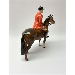 A Beswick equestrian figure modelled as a huntsman on bay horse, with printed mark beneath, together with a Beswick Norman Thelwell figure of a pony and rider, with printed mark beneath  
