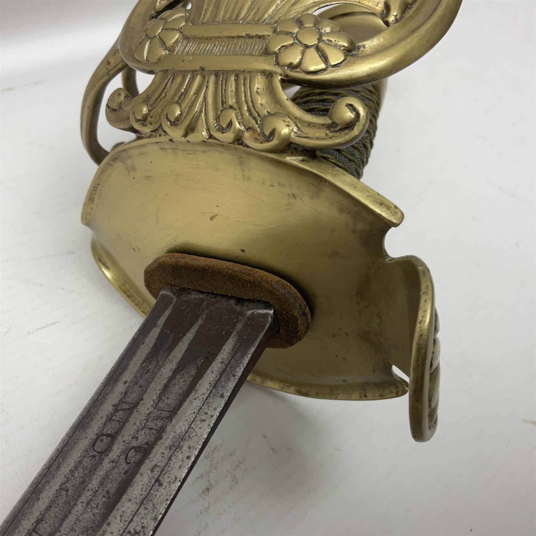 French 1816 Pattern Cavalry of the Line Officer's sword, the 92cm double edged blade engraved 'No Me Saques Sin Razon - No Me Embaines Sin Honor', with later brass hilt and wire-bound fish skin grip L108.5cm overall (no scabbard)