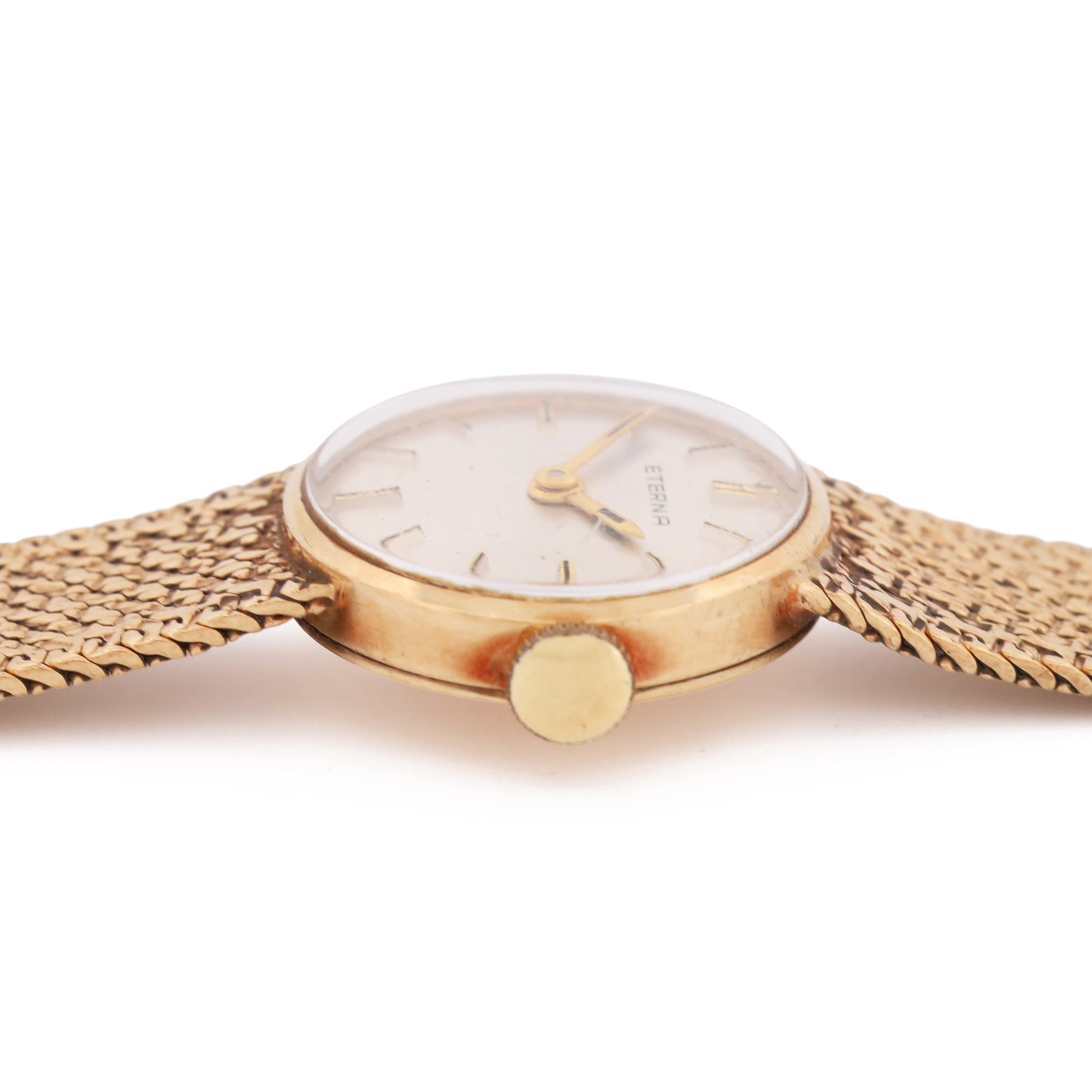 Eterna ladies 9ct gold manual wind wristwatch, silvered dial with baton hour markers, on integral 9ct gold bracelet, London 1968