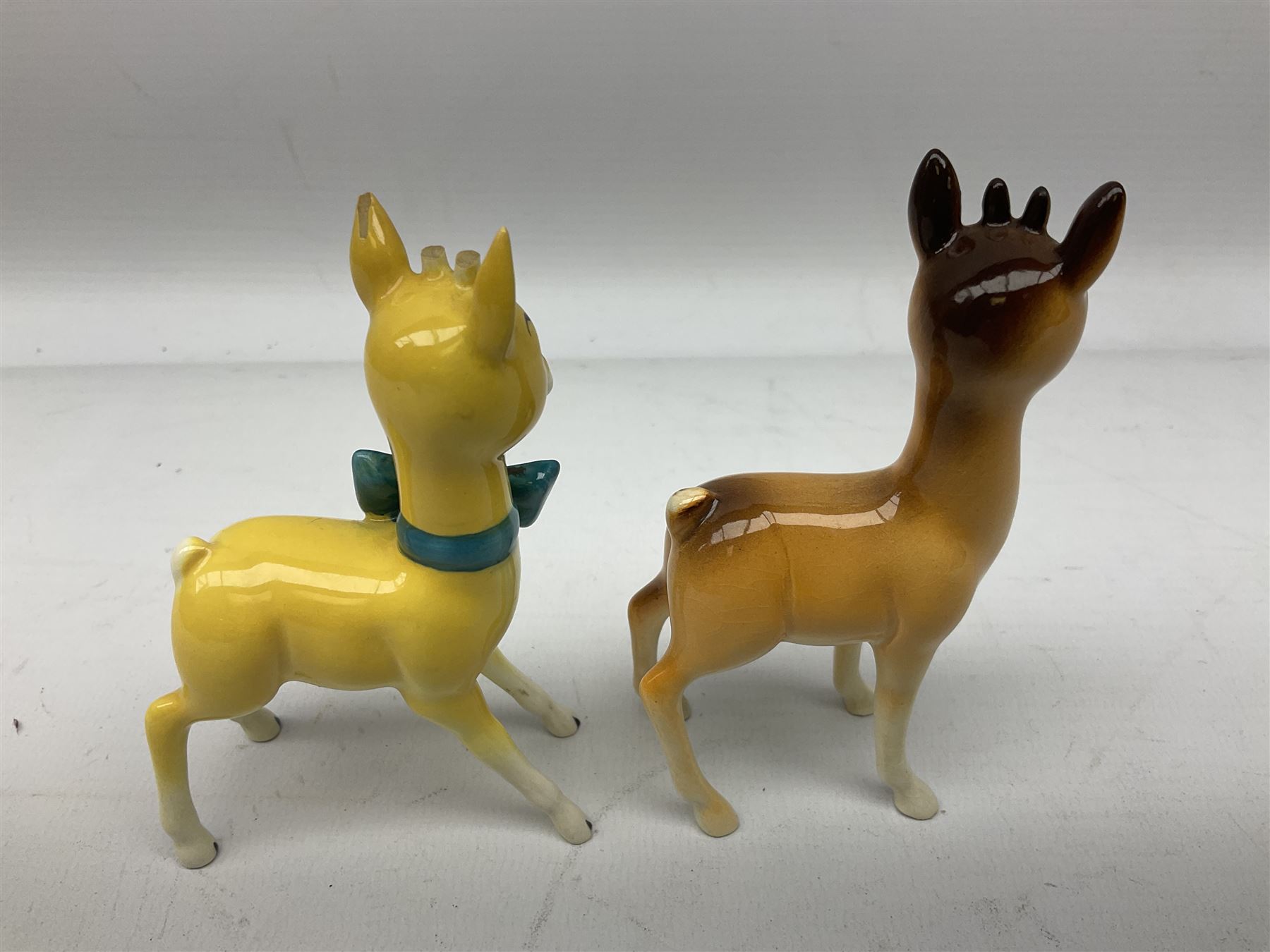 Collection of Beswick figures to include Beatrix Potter Squirrel Nutkin, Jemima Puddleduck, Spike and Tyke, Tom and Jerry, both boxed and with certificates, Chamois 1551 and Babycham 1615a (a/f) Beswick Ware Royal Douton Peter Rabbit and Benjamin Bunny, with certificate
(9)
