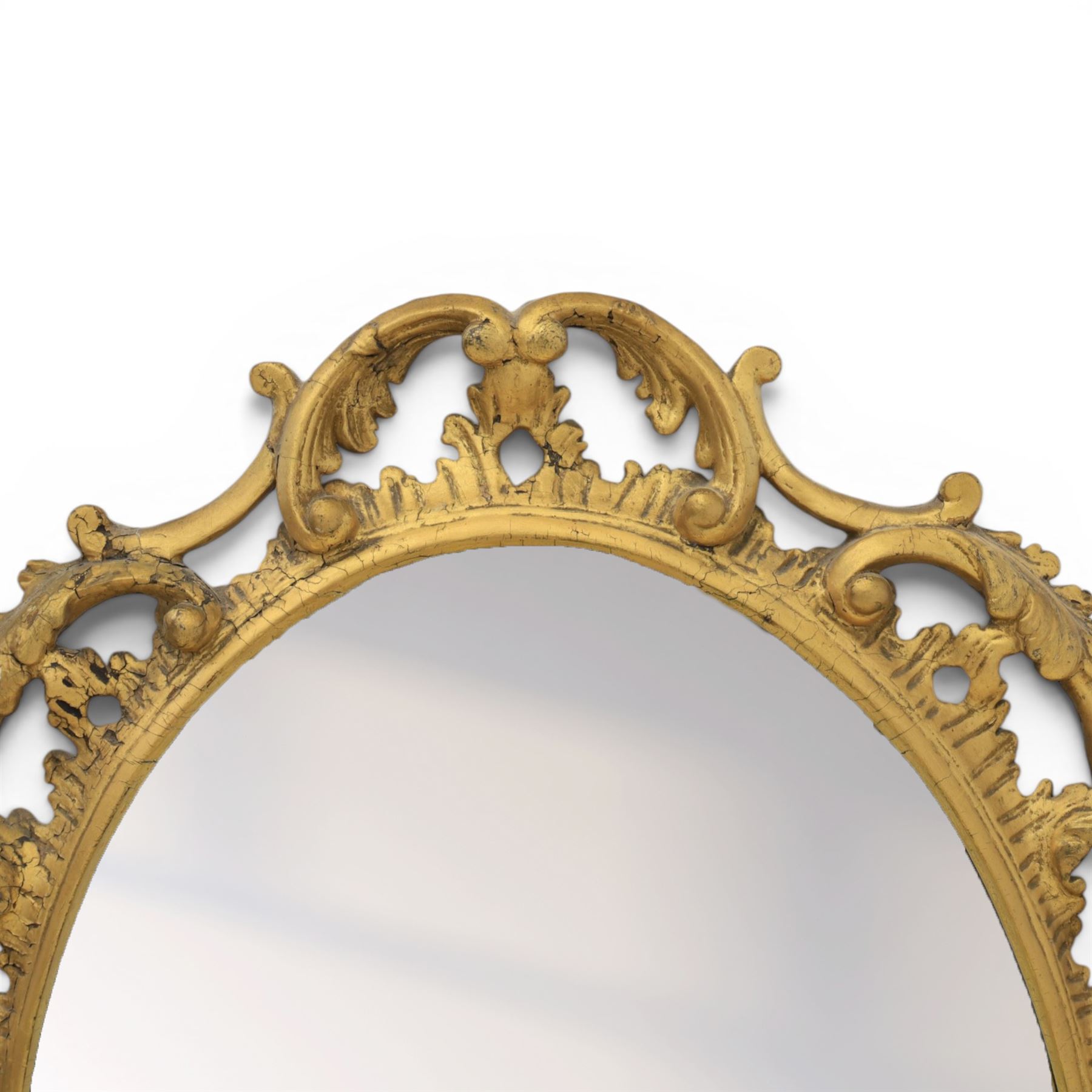 Rococo design gilt framed oval wall mirror, pierced frame with foliate design 