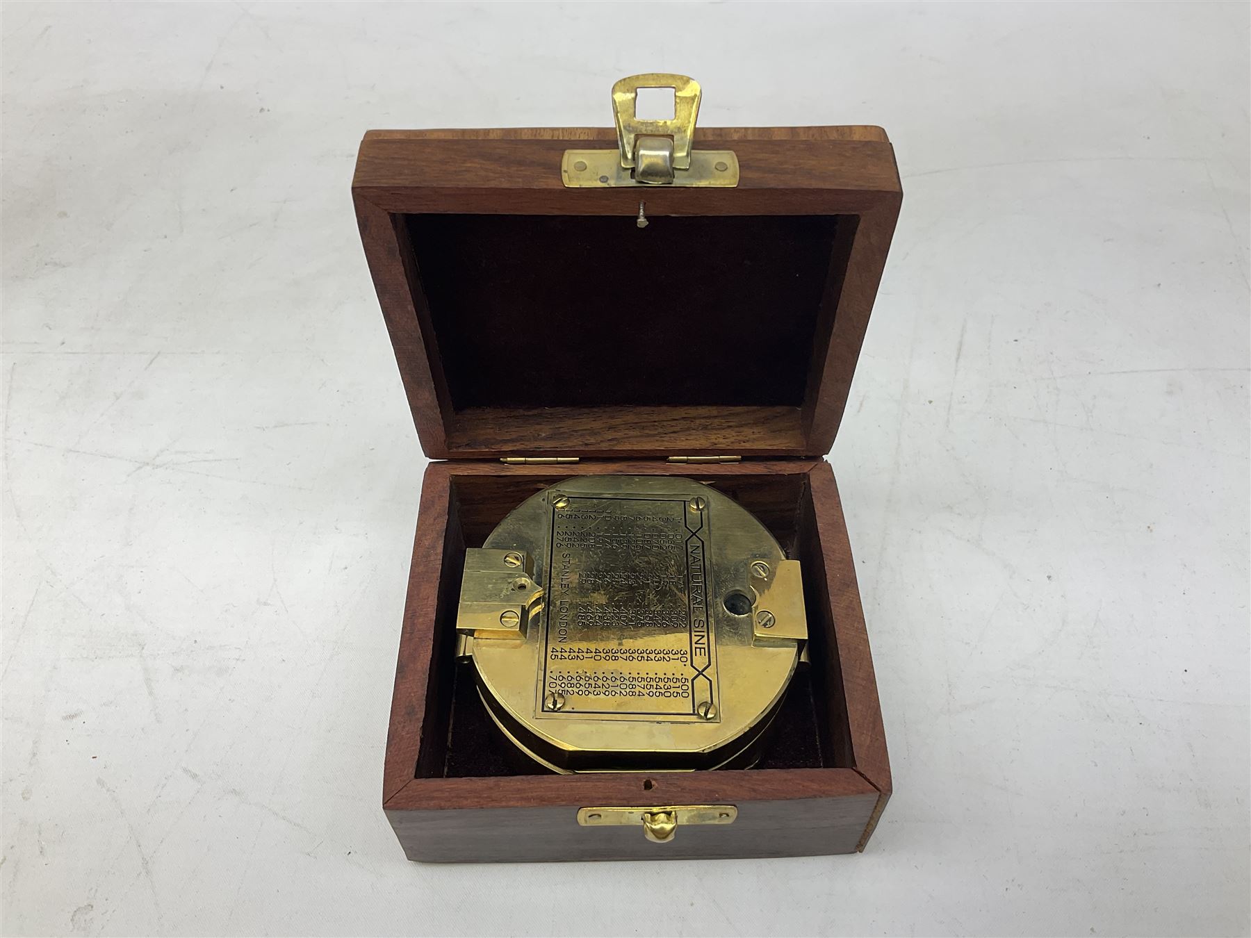 Brass compass marked Stanley London, in wood case