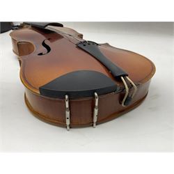 Czechoslovakian violin c1920 with 36cm two-piece maple back and ribs and spruce top, bears label 'Copy of Antonius Stradivarius Made in Czechoslovakia' L59cm; in carrying case; 1950s Czechoslovakian violin; and 195os Czechoslovakian three-quarter size violin; both cased (3)