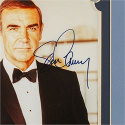 James Bond 40 years 20 films signed commemorative montage, comprising signed photographs of Sean Connery, George Lazenby, Roger Moore, Timothy Dalton and Pierce Brosnan, each with a certificate of authenticity from UACC Dealer Lester Freeman, framed, frame H79cm, W100cm