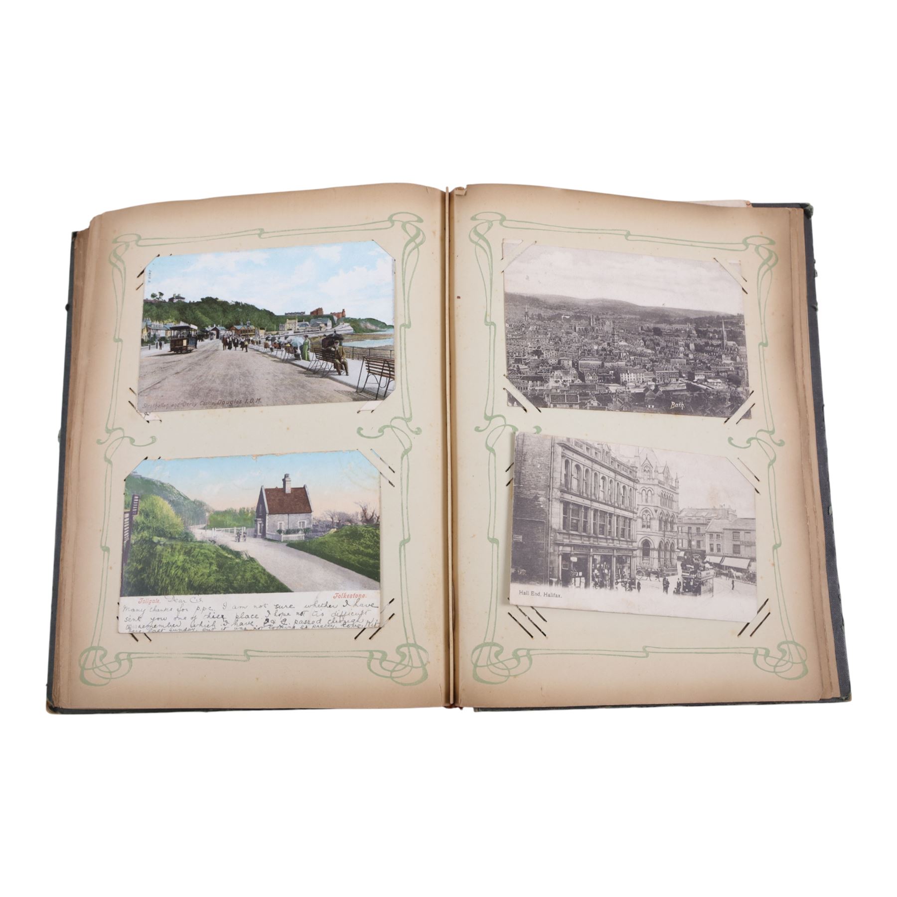 Collection of early 20th century postcards and greetings cards, including WWI embroidered silk Christmas card, black and white family photographs, 1920s birthday cards, black and white and colour postcards of Margate, Ramsgate, Blackpool etc, housed in three postcard albums