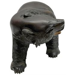 Black Forest style hardwood carving, modelled a bear upon all fours, H22cm