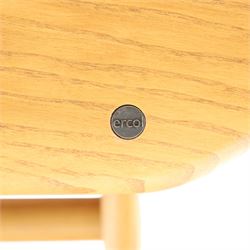 Ercol - 'Windsor' ash medium extending dining table, with stowed fold over leaf extending to 200cm, shaped supports with roundel aperture, united by a stretcher