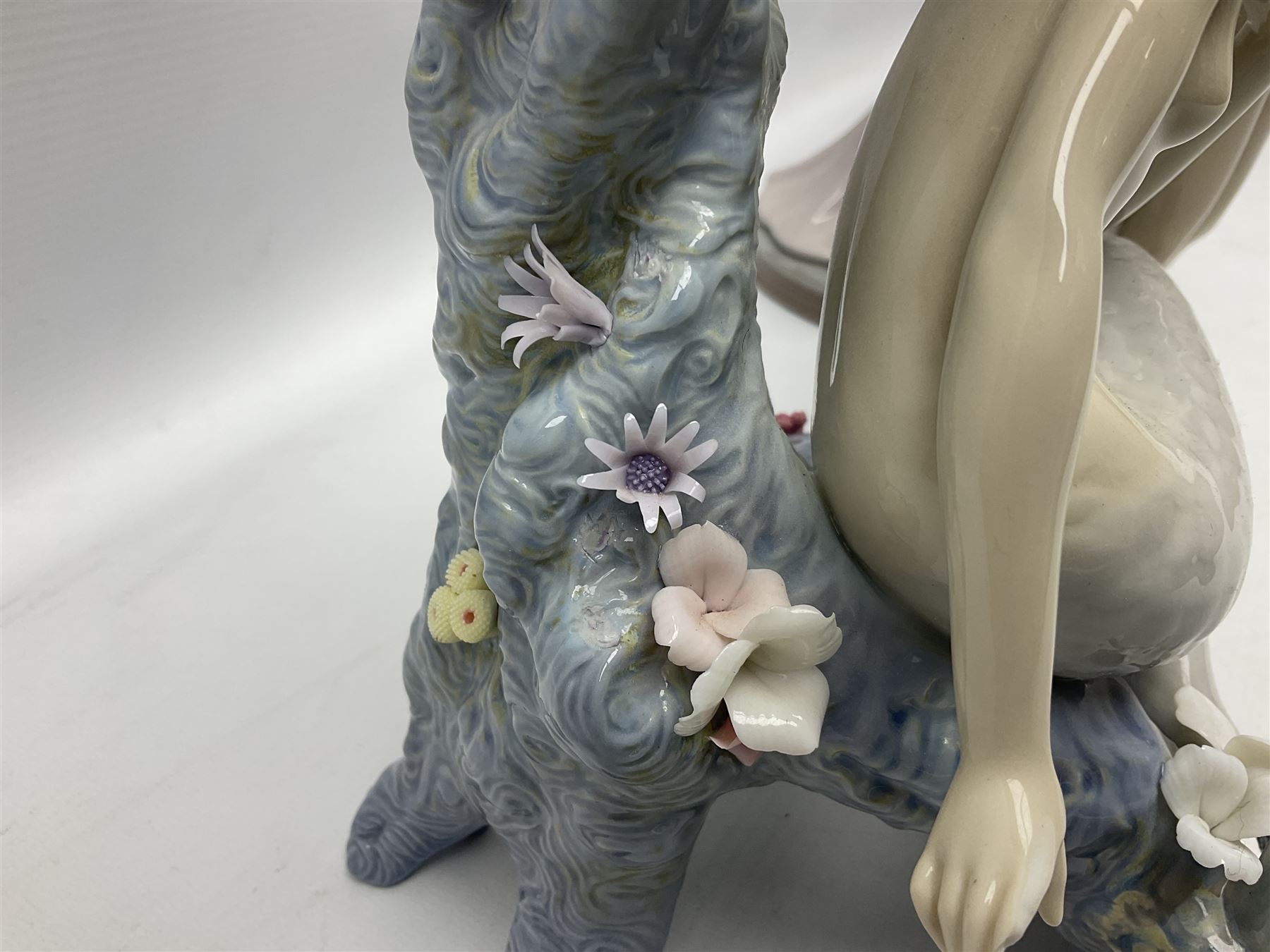 Four Lladro figures, comprising Touch of Class no 5377, Boy Student no 4517, Ocean Beauty no 5785 and Carnival Couple no 4882, largest example H45cm