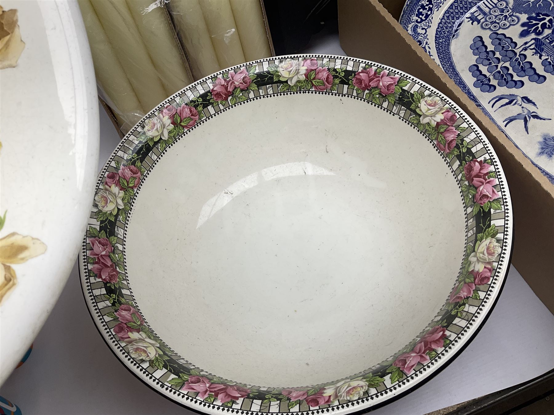 Blue and white meat platter and a similar blue and white meat draining plate, together with a pink ceramic floral jug and bowl, three packs of church candles and a wooden screen, etc 