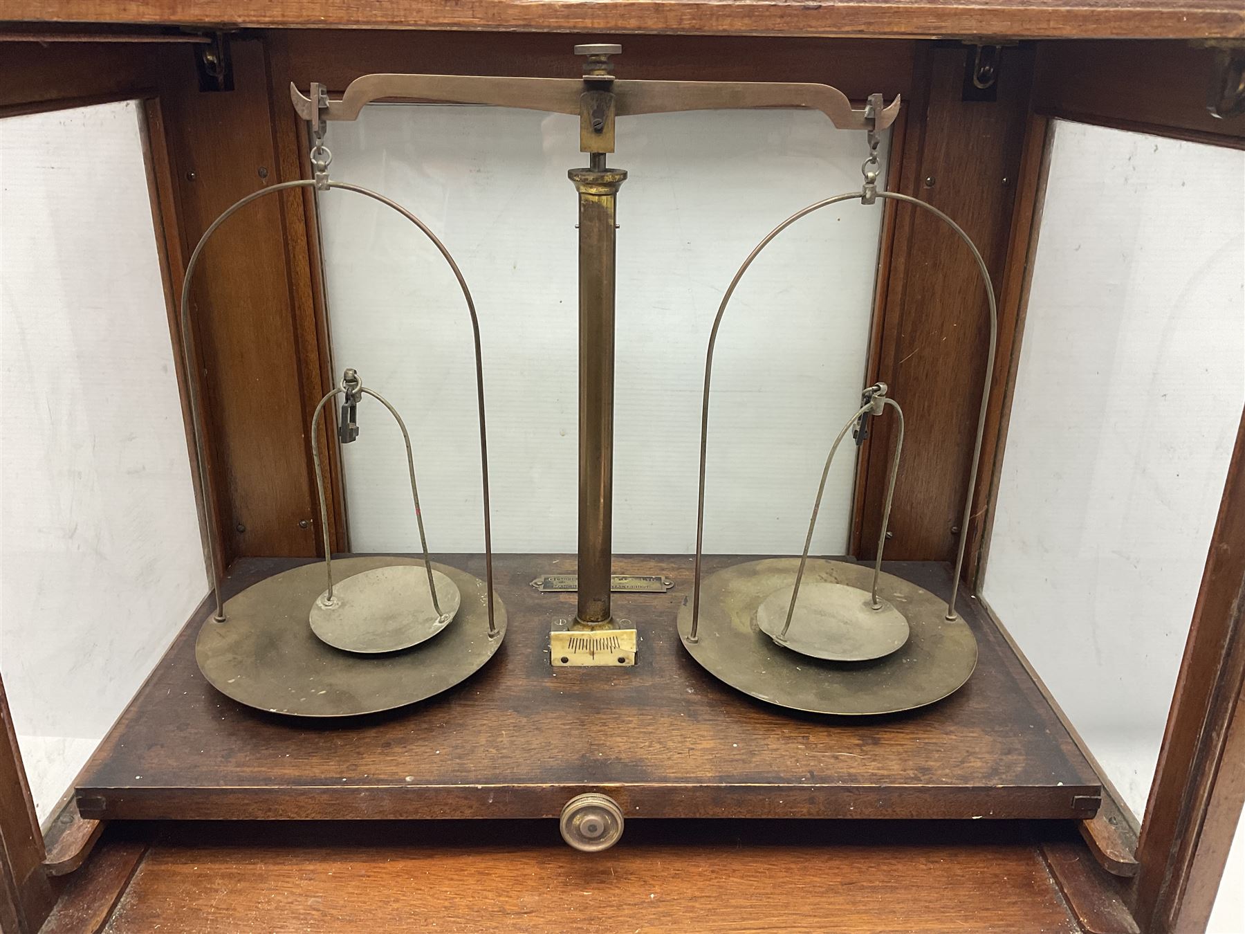 Collection of textile equipment, comprising, Goodbrand & Co. mahogany and brass yarn tester, Negretti & Zambra barograph and two sets of precision scales