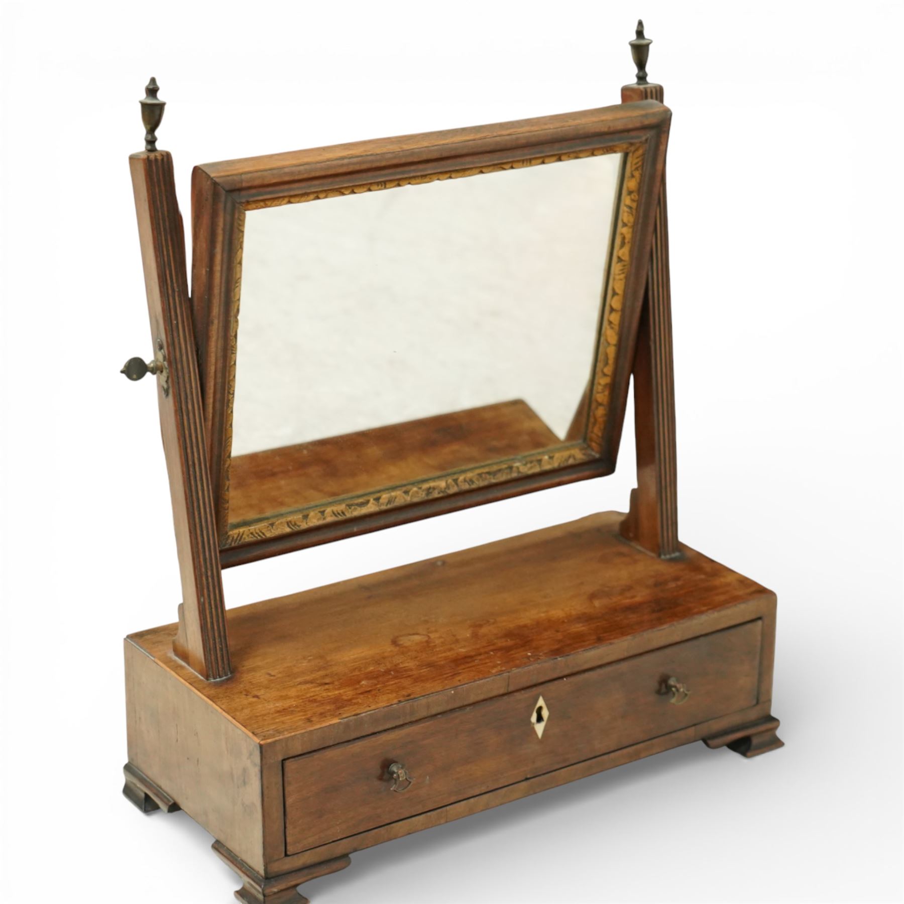 Two late 19th century mahogany toilet mirrors and a towel rail, one oval adjustable mirror on shaped uprights over a two-drawer base (H 73cm, W 48cm), the other with rectangular mirror plate on a hinged frame above a drawer base (H 44cm, W 37cm, D 17cm), together with a turned mahogany towel rail with arched top rail, double lower rails and splayed feet (H 81cm, W 65cm)