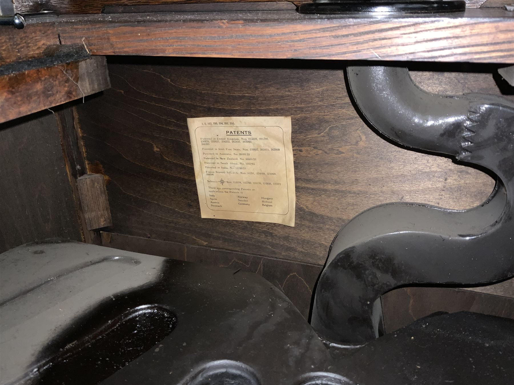 Early 20th century ‘HMV' 202 cabinet gramophone, oak cased, moulded top with foliate carved moulding hinges to reveal gramophone, two doors enclosing horn, on turned supports joined by moulded stretcher rails