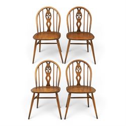 Ercol - Set of four dark elm 'Fleur De Lys' chairs