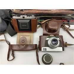 Quantity of cameras, to include Zeiss Ikon 'Contaflex' with 'Tessar 1:2,8 50mm' lens, Olympus Pen camera, etc, some in cases, camera accessories, and Greenkat 60mm Spotting Scope with case and box