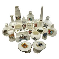 Eighteen WW1 crested china military models including artillery shells, visor caps, water bottles, binoculars, war memorials/cenotaphs etc; various makers including Goss, Arcadian China, Carmen China, Tuscan China, Aynsley, Swan China etc; various crests including London, Dover, Margate, Rugby, RA, RAMC, Caterham, Cowes, Ostende etc (18)