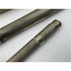 Three parker fountain pens, one example with 14ct gold plated cap and personal engraving, in Parker 51 box, together with a silver Sampson Mordan Everpoint propelling pencil with personal engraving and a silver cased fountain pen with 14ct gold nib and a souvenir bronze Dollfus-Mieg medallion, awarded to John G Sedorski, in fitted case 